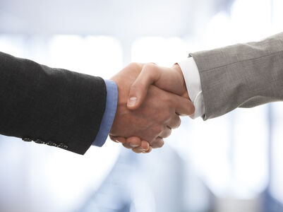 Business deal with DiscussThis A photo of a handshake