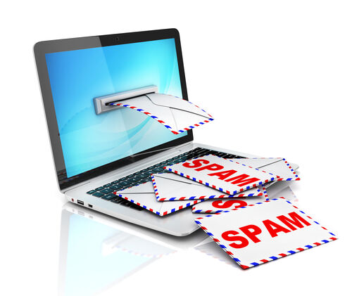 Email spam A graphic of spam coming out of a laptop