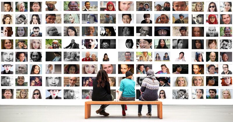How to build an email list A group of people looking at photos of people