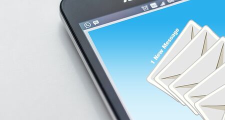 Photo of a tablet with envelopes on the screen